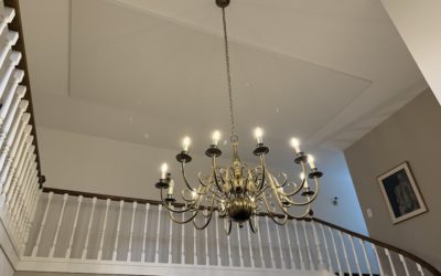 Plafond acoustique tendu dans un hall d’entrée à Morges